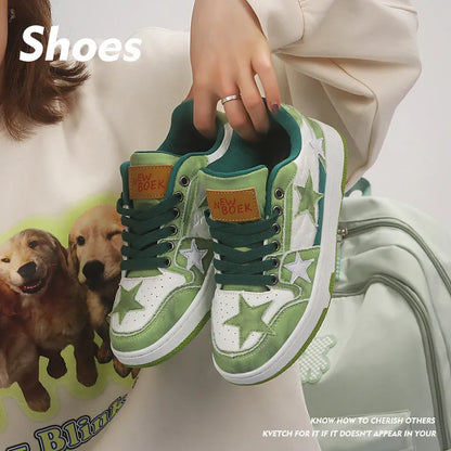 Denim skate shoes with flat rubber sole, lace-up front, and mesh lining in black, green, or pink.