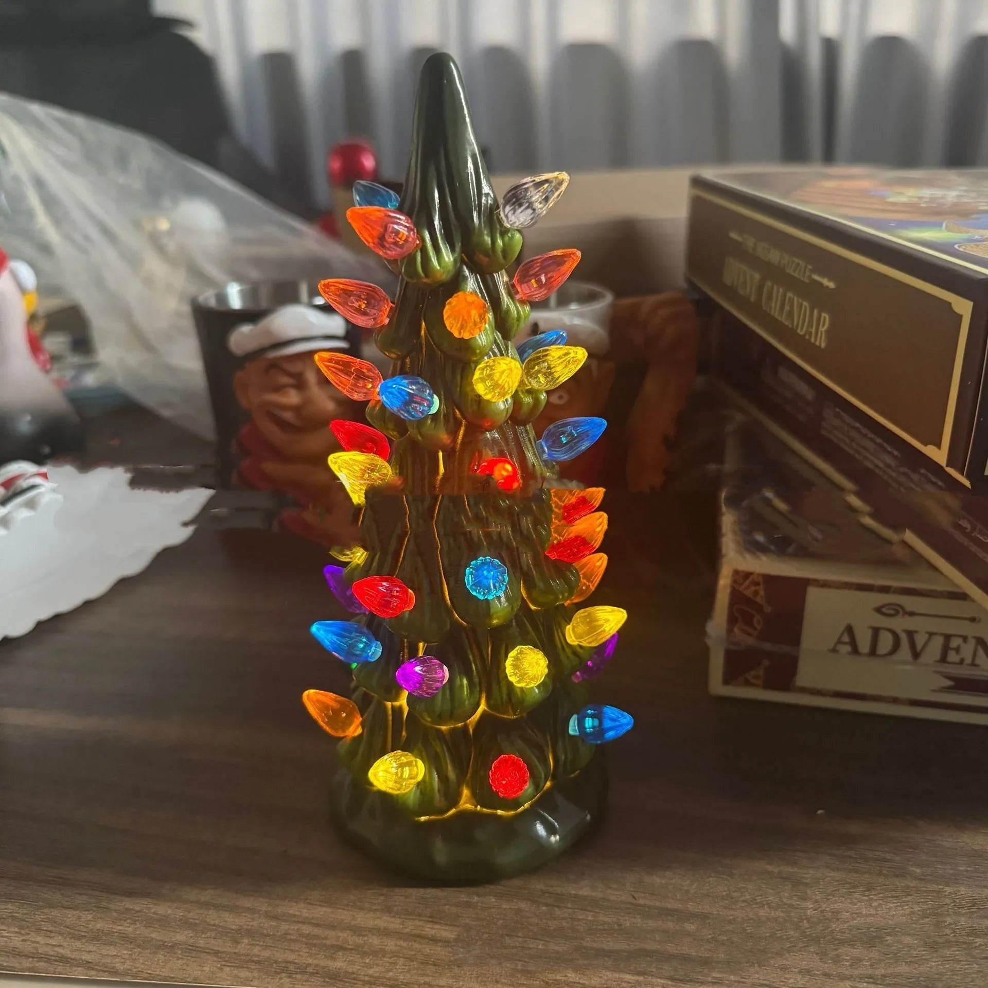 European-style Christmas tree decoration with LED lighting in resin construction