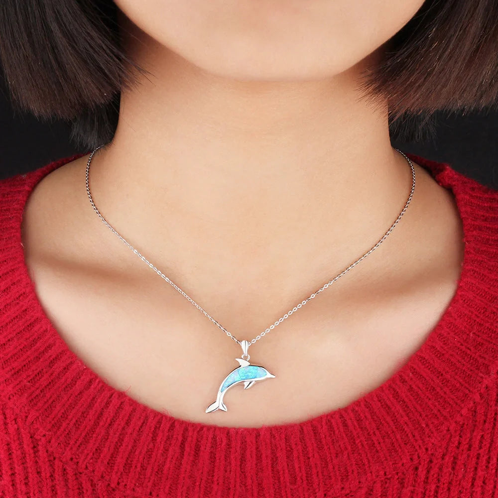 Ocean Dolphin Pendant Copper Necklace with opal detail, showcasing the intricate dolphin design and adjustable chain.