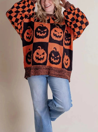 A stylish Halloween sweater featuring a unique pumpkin and ghost graphic design, available in a variety of fashion-forward colors.