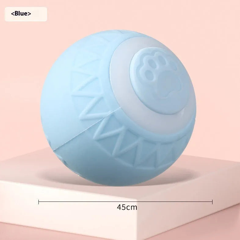 Blue automatic cat toy ball bouncing on floor with silicone construction and rechargeable design