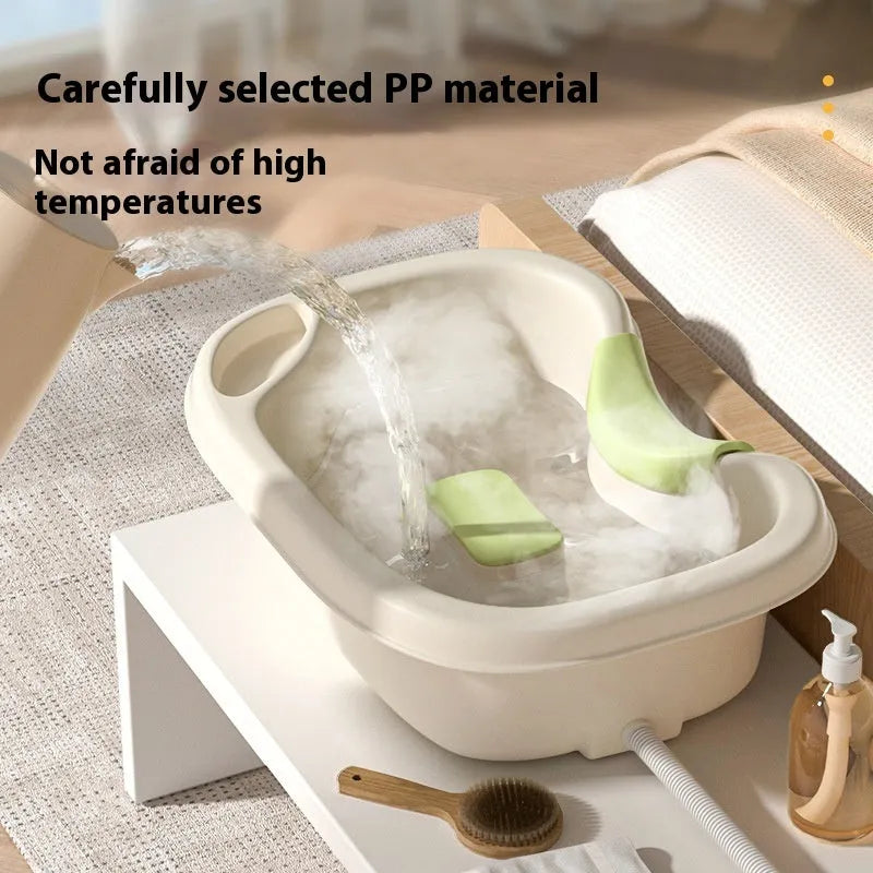 Portable plastic shampoo basin with neck pillow and water pump for bed hair washing.