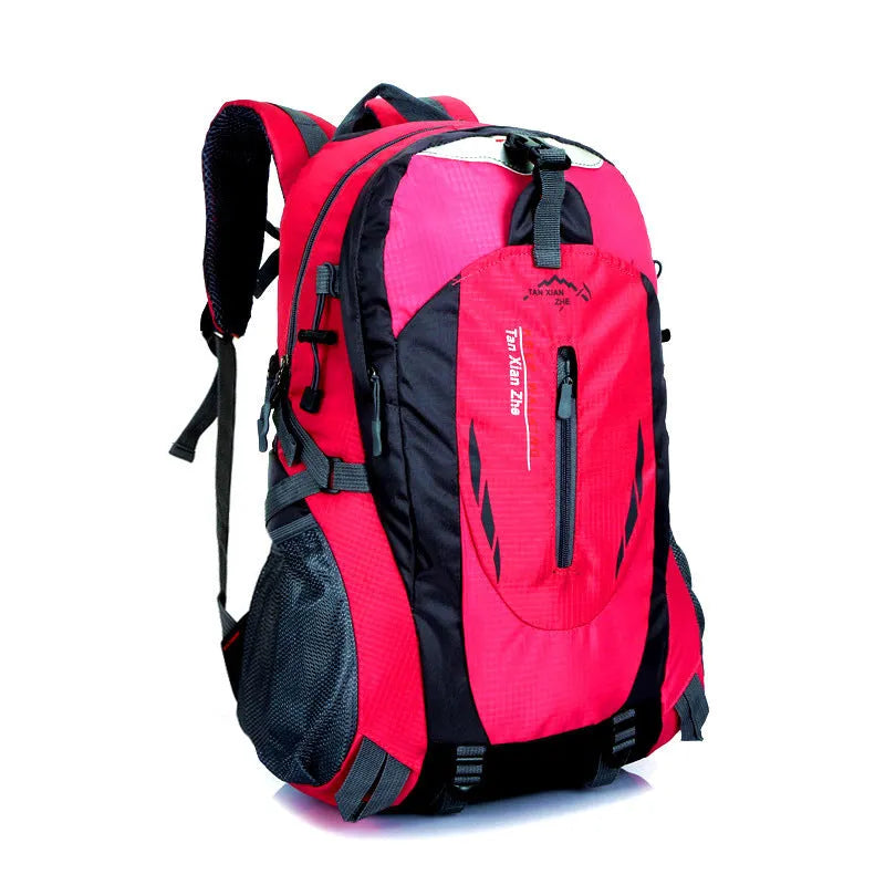 Large red outdoor travel backpack made of oxford cloth, showing front compartments and carrying straps.