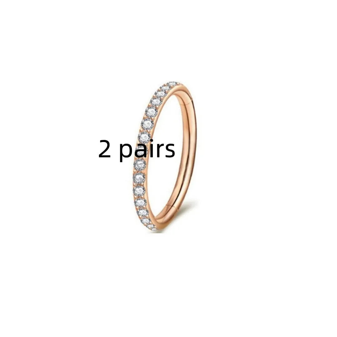 Stainless steel nose ring with diamond accent in seamless round design, showing size options and colour variations