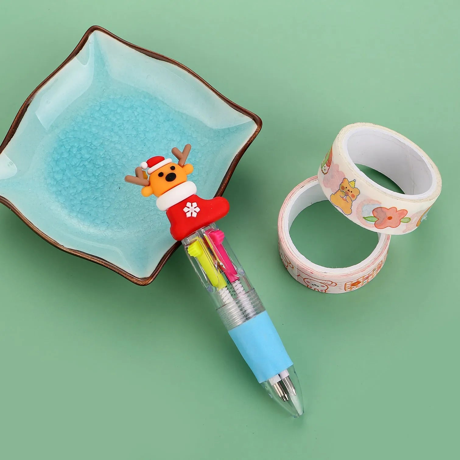 Christmas four-colour ballpoint pen with press mechanism showing festive designs