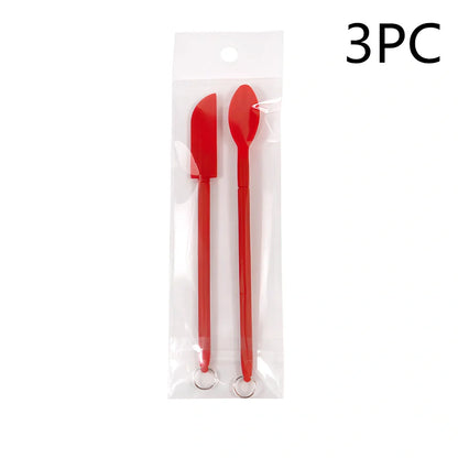 Retractable silicone cosmetic spatula extended to 15cm with scraper tool for product application