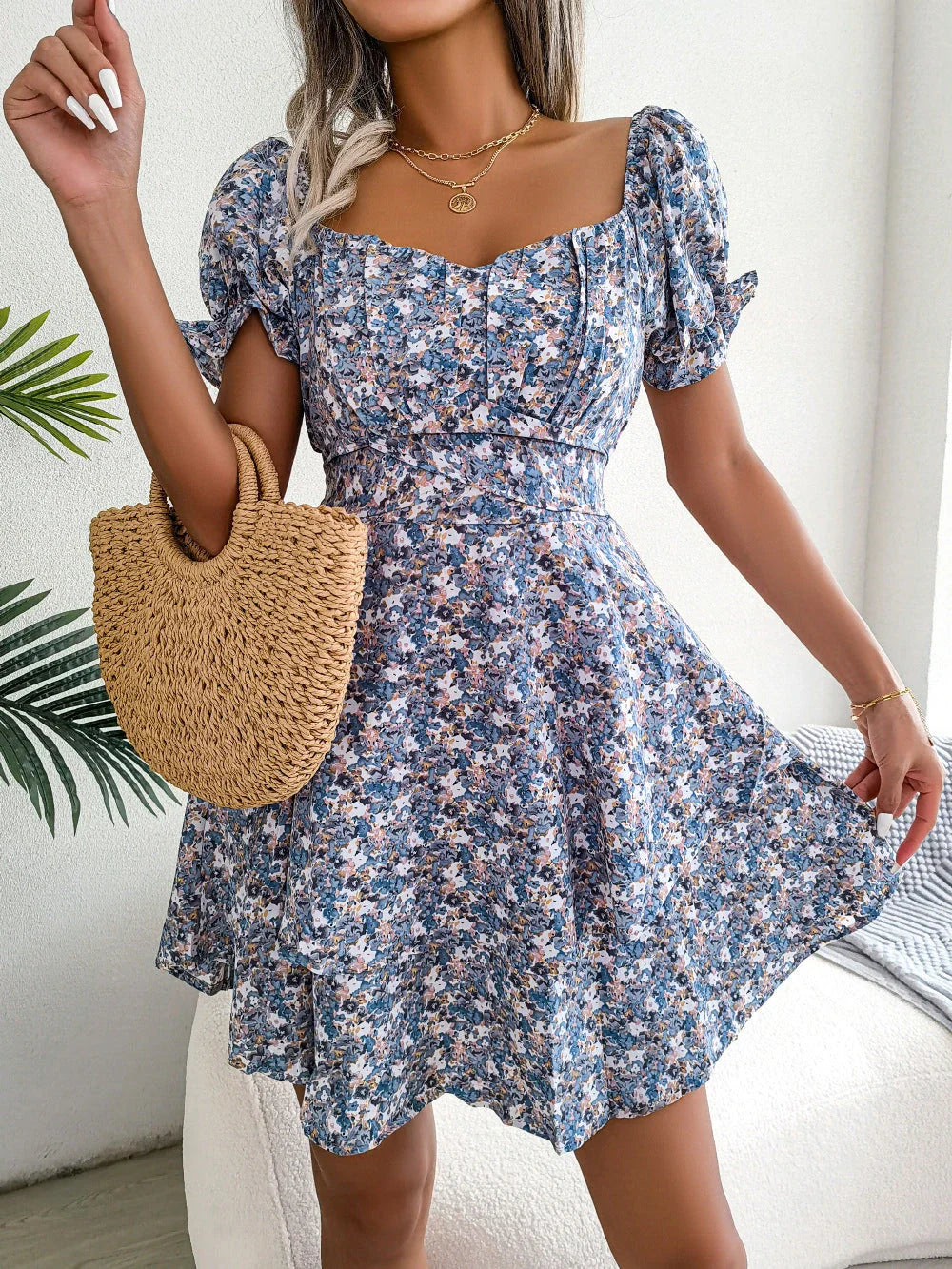 Elegant floral mini dress with A-line silhouette and short sleeves in a variety of vibrant colors
