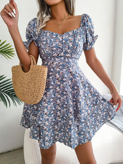 Elegant floral mini dress with A-line silhouette and short sleeves in a variety of vibrant colors