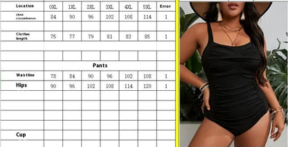Black solid colour plus size one-piece swimsuit for women on a hanger.