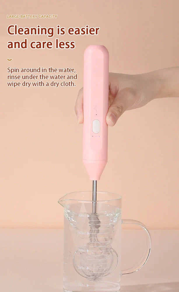 Black hand-held electric whisk with stainless steel beaters and digital speed display