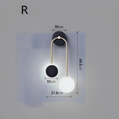 Nordic wall lamp with black gold finish and LED lighting, mounted beside bed with dimming controls