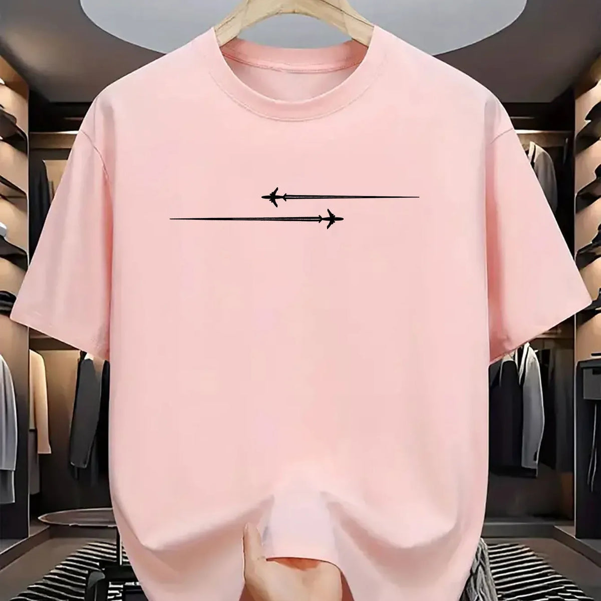 Loose-fit printed cotton blend T-shirt in black on a hanger
