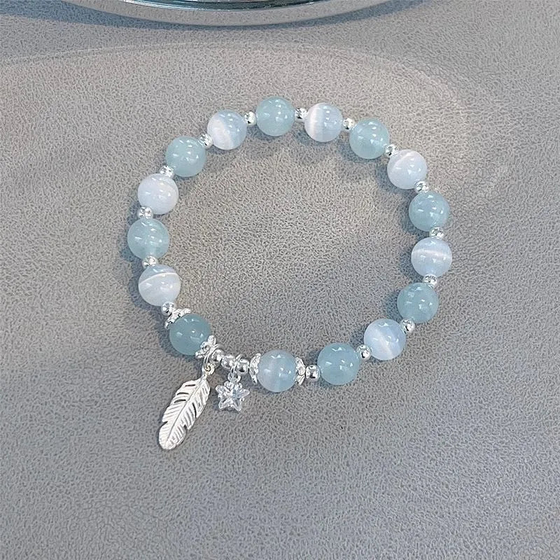 Small white girl crystal bracelet with feather XINGX blue moonlight colour and Korean style design