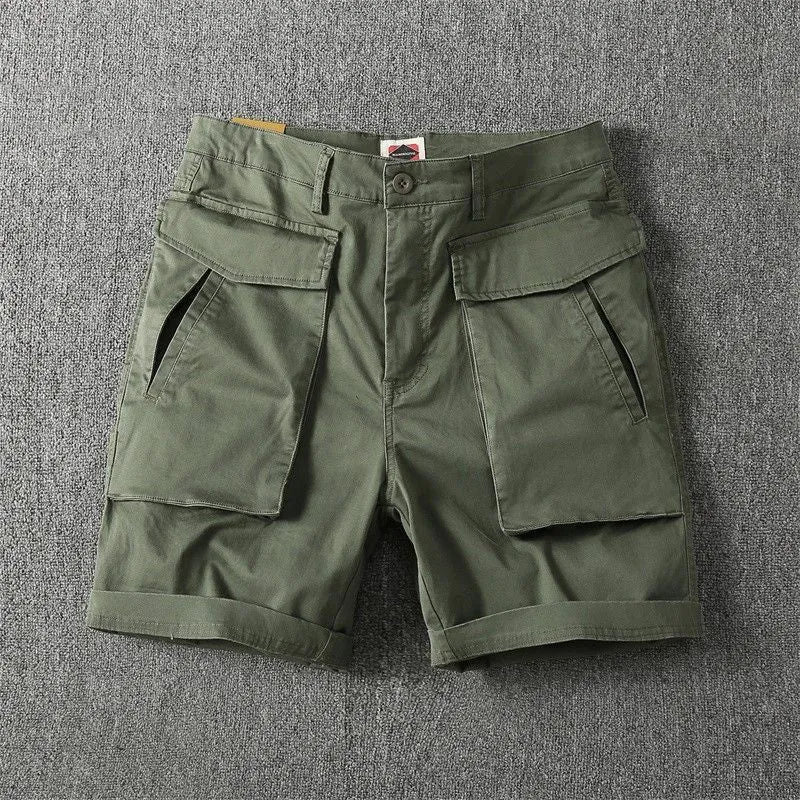 Men's straight-leg cargo shorts in Army Green with multiple pockets, showing micro-elastic cotton fabric detail