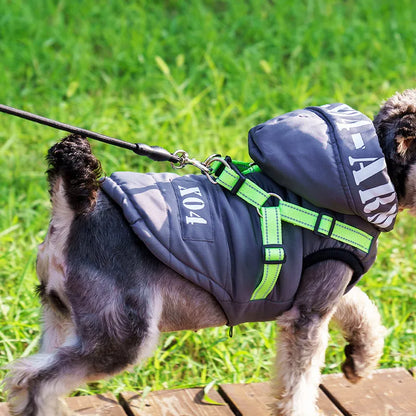 Red fleece-lined waterproof dog winter jacket with hood shown on medium-sized dog