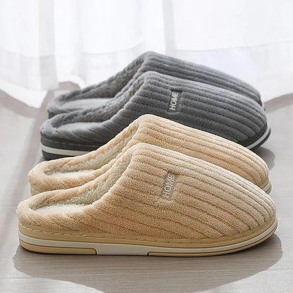 Cozy cotton slippers in various colors, featuring a soft, plush lining and non-slip rubber sole for indoor comfort and warmth