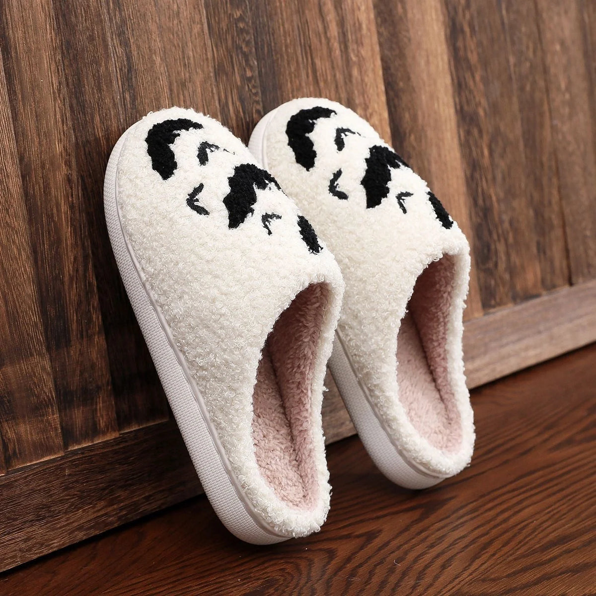 Halloween bat design plush slippers for indoor wear, available in white and black
