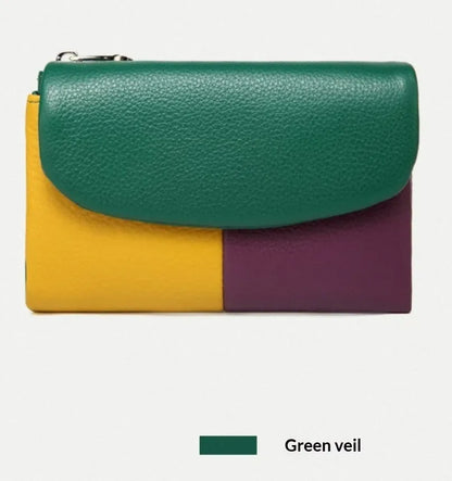 Women's short wallet in soft leather texture with solid colour and stitching detail, urban minimalist style