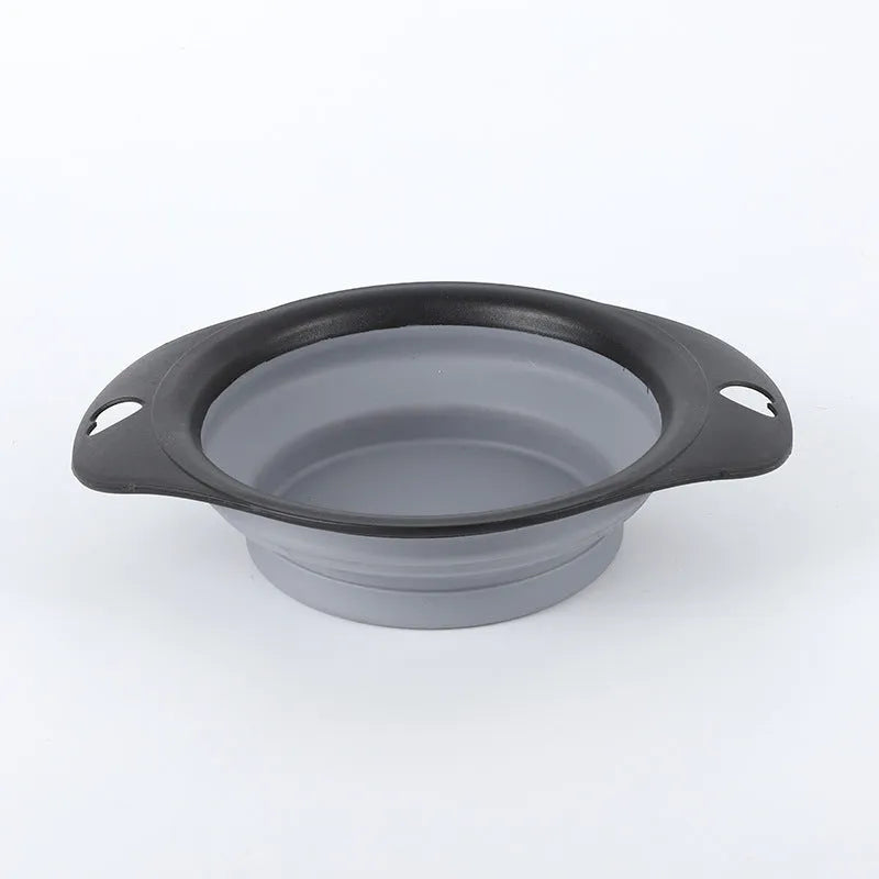 Collapsible silicone pet food bowl shown folded flat and unfolded, in green colour with non-slip base