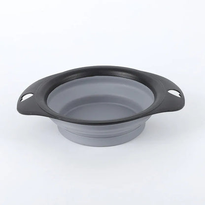 Collapsible silicone pet food bowl shown folded flat and unfolded, in green colour with non-slip base