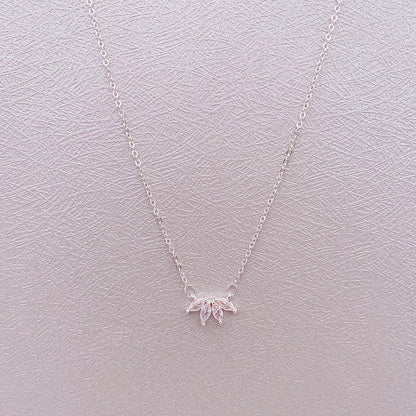 Minimalist lotus flower petal necklace in gold or silver, perfect for women and girls.