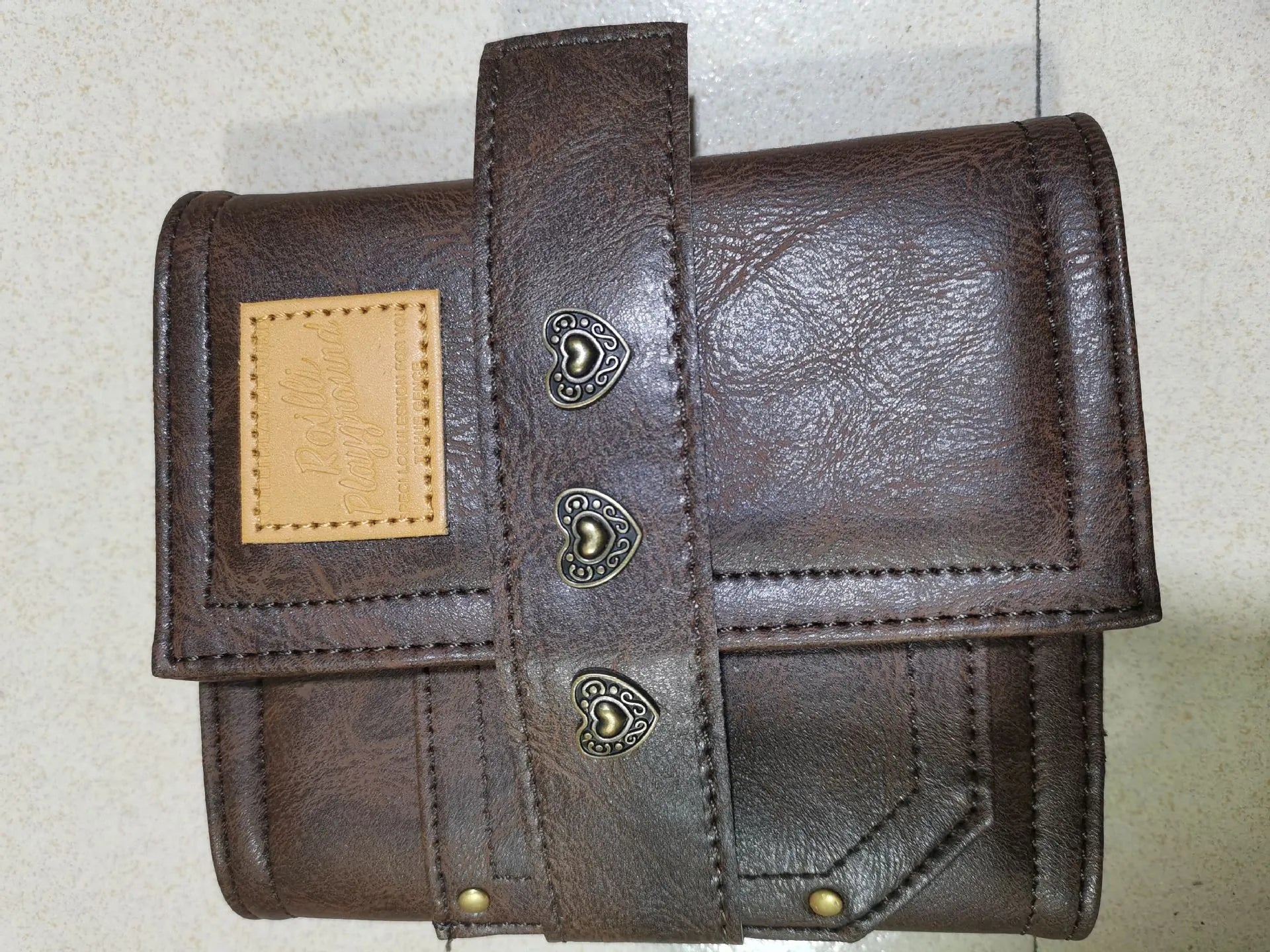 Brown A7 retro leather buckle notebook with loose-leaf binding on PU cover