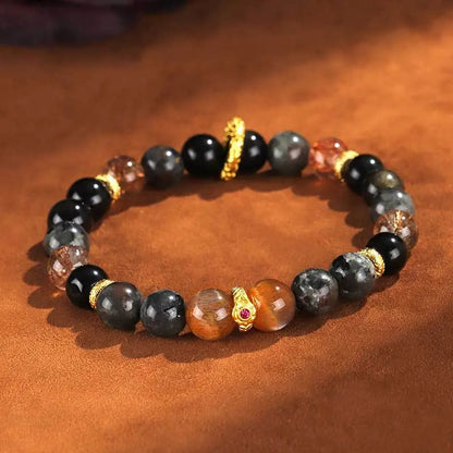 Handcrafted black Sunstone flame stone Wukong bracelet on wrist showing stone bead detail