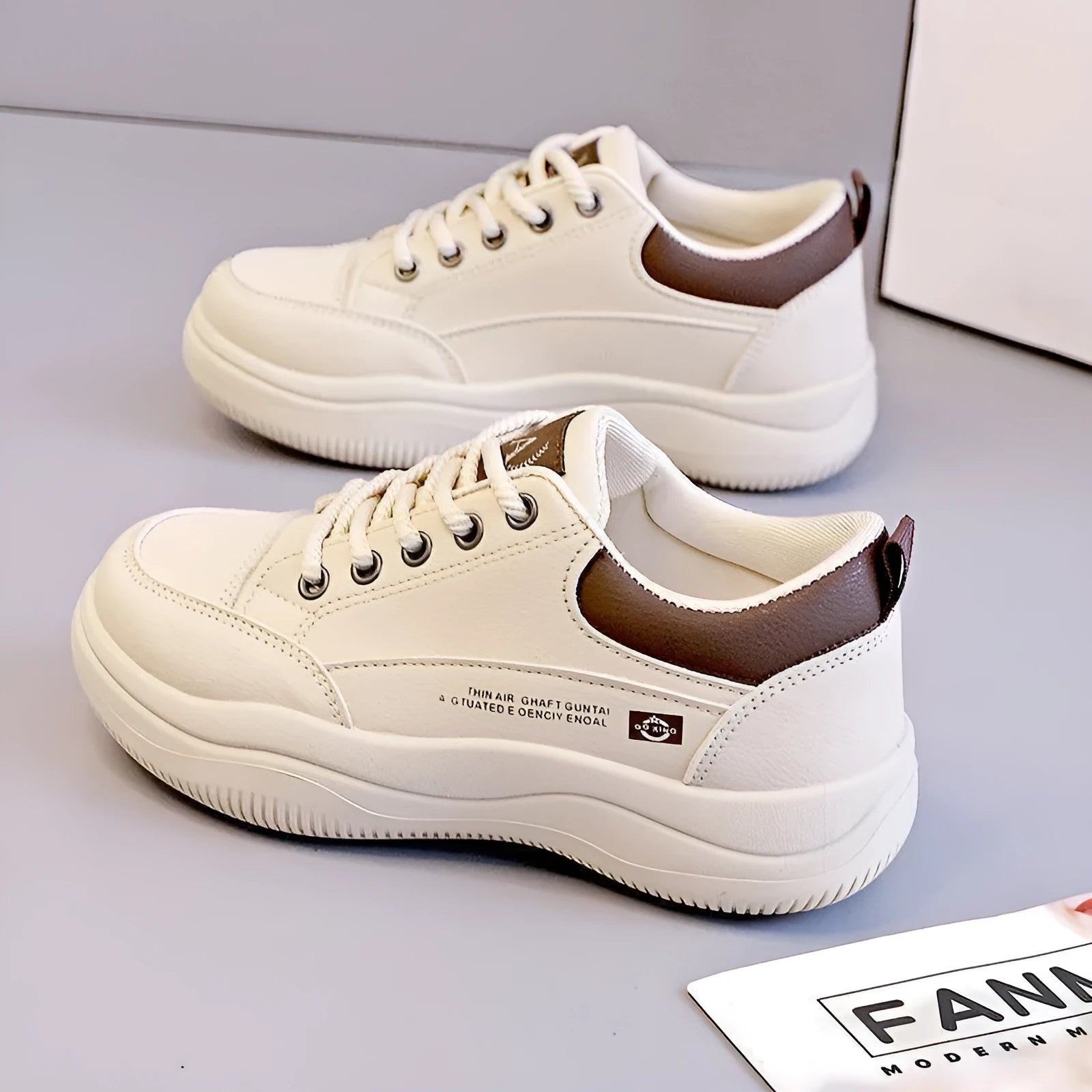 Women's white Korean-style lace-up pumps with a cross strap detail and a mid heel.