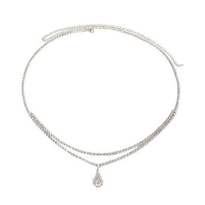 Gold water drop pendant waist chain with tassel detail and lobster buckle closure on white background