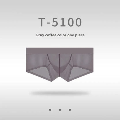 Men's seamless low-waist underwear in nylon fabric, shown in a neutral colour on a plain background.
