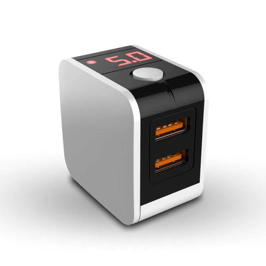 Black dual USB fast charger with digital voltage display showing 5V output and foldable UK plug