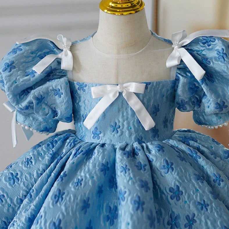 Blue polyester girls' princess dress with pettiskirt layering, shown in princess style for birthday occasions