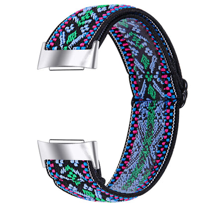 Printed elastic watch strap for Fitbit Charge 6 with adjustable sizing and multiple colour options