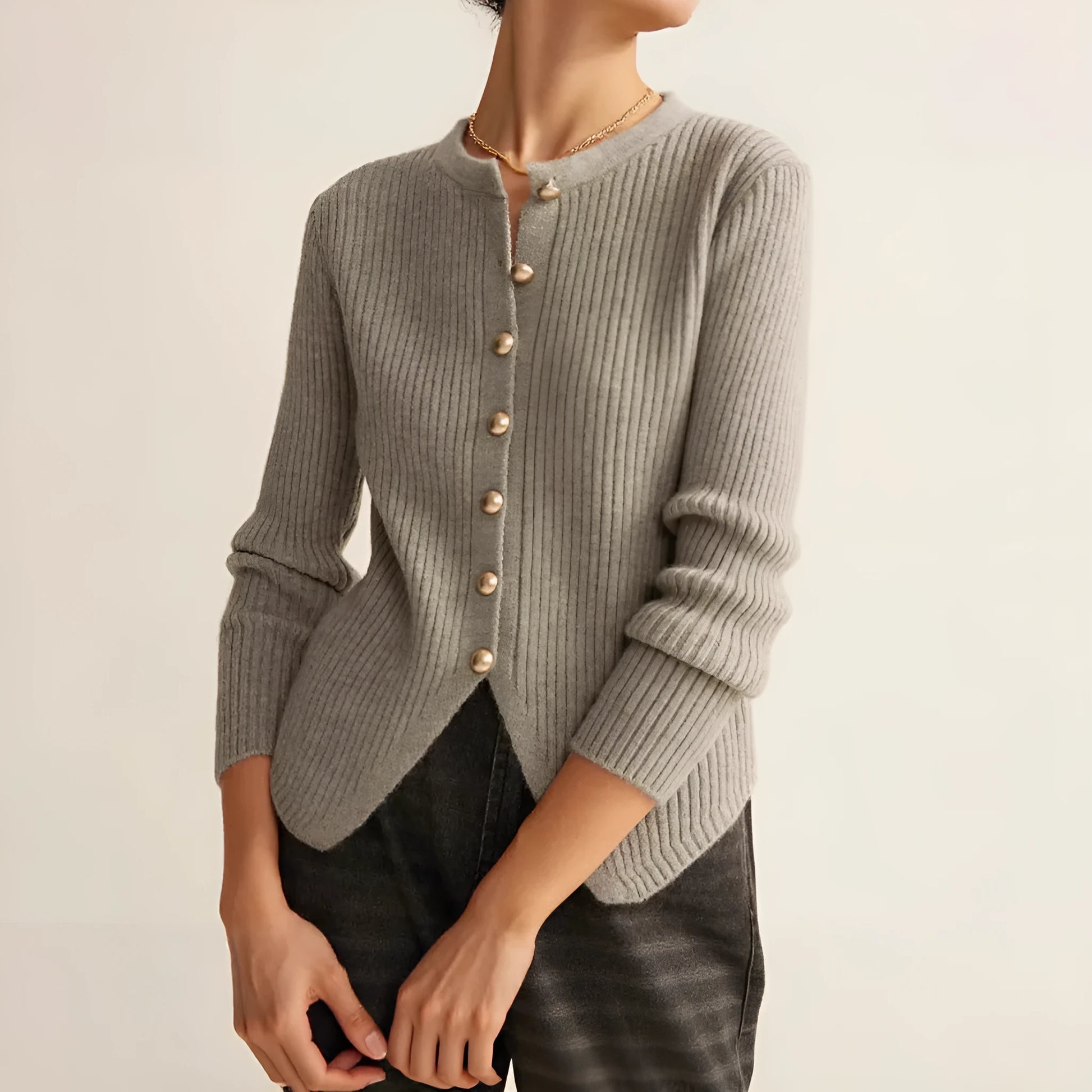 Women's silver loose fit cardigan sweater showing front and back views, Asian sizing label visible.