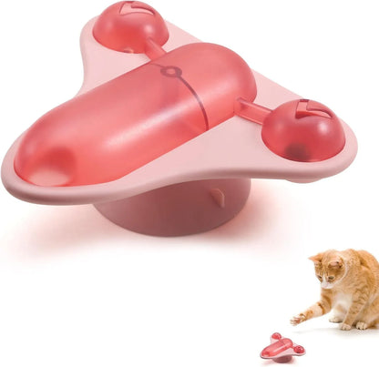 Blue interactive pet puzzle toy with bell, catnip, and snack cabin on a floor.