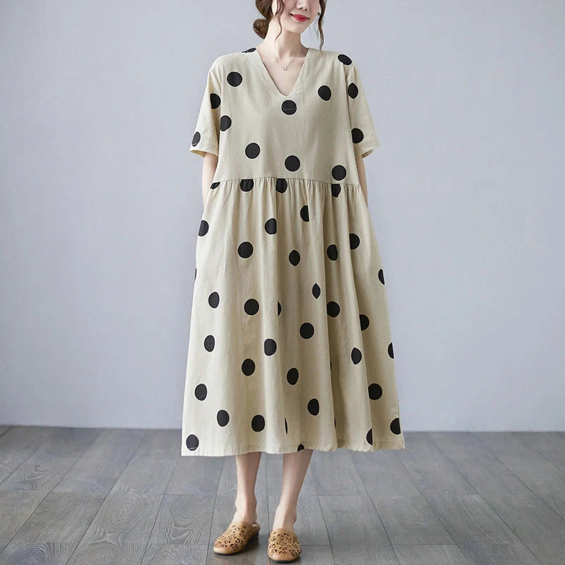 Loose-paneled cotton and linen V-neck short-sleeved dress in apricot, perfect for summer