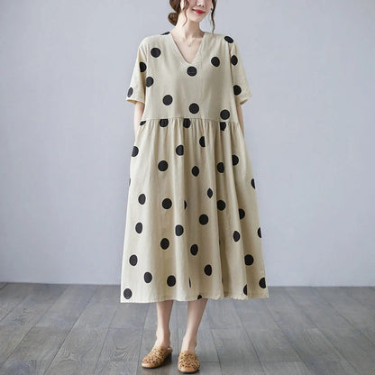 Loose-paneled cotton and linen V-neck short-sleeved dress in apricot, perfect for summer