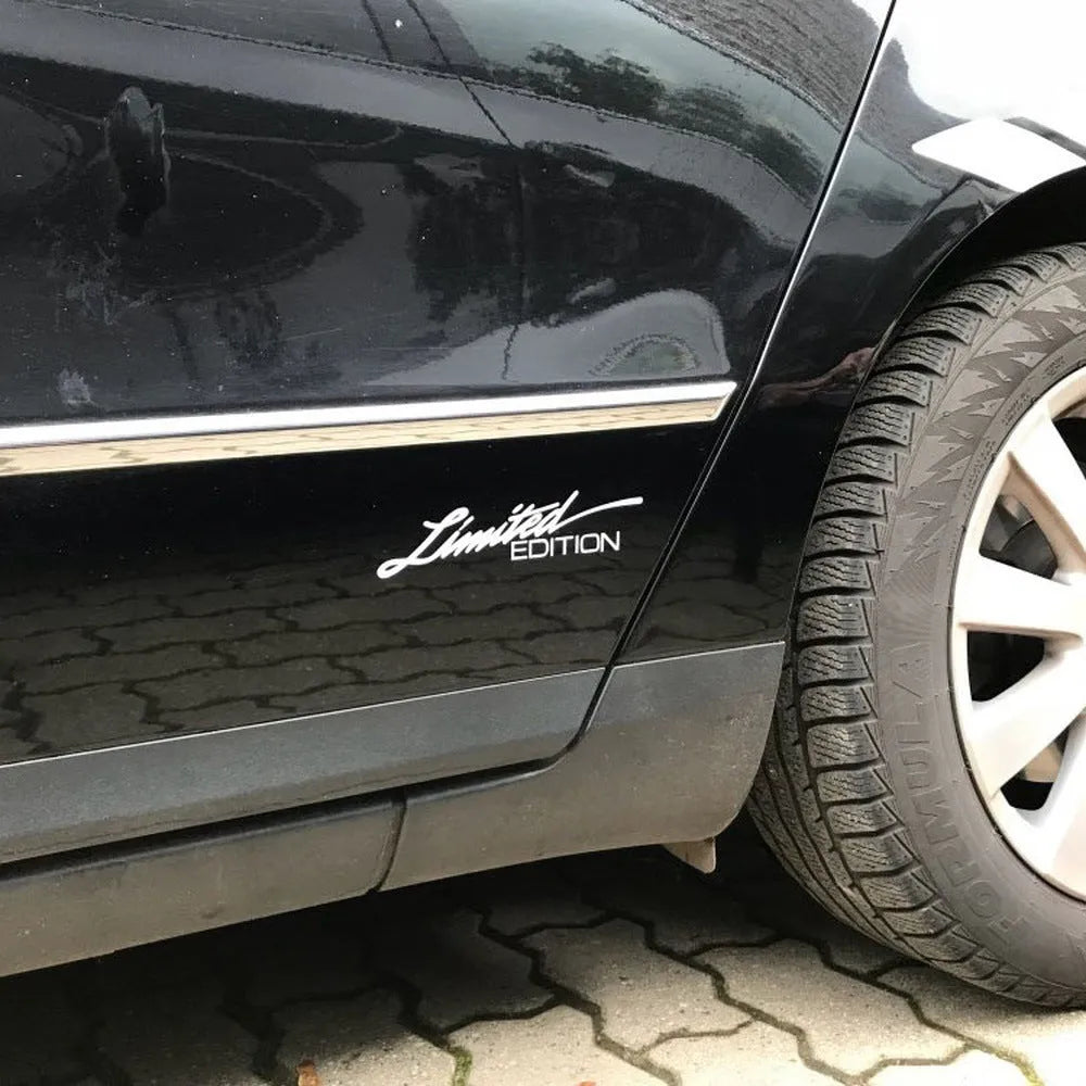 Reflective plastic bumper sticker measuring 16cm by 3.8cm with British English text