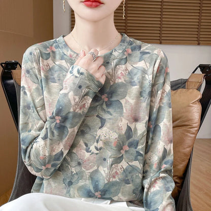 Round neck floral print pullover shirt in Tencel cotton blend fabric on hanger