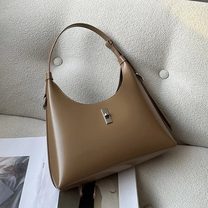 Genuine leather dumpling-shaped crossbody shoulder bag in six colour options showing sandwich pocket and internal organisation