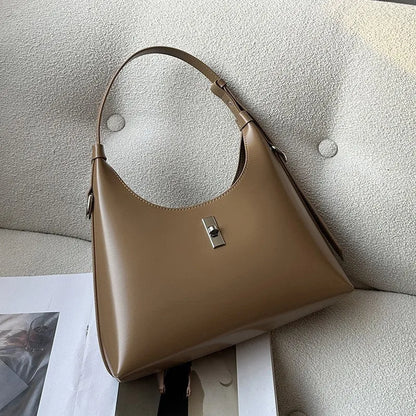 Genuine leather dumpling-shaped crossbody shoulder bag in six colour options showing sandwich pocket and internal organisation