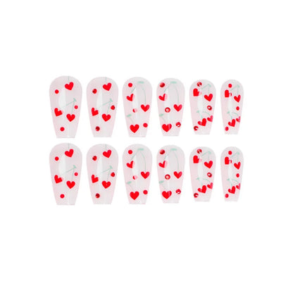 Sheet of 24 red diamond and cherry patterned nail art stickers with a small tube of adhesive glue.