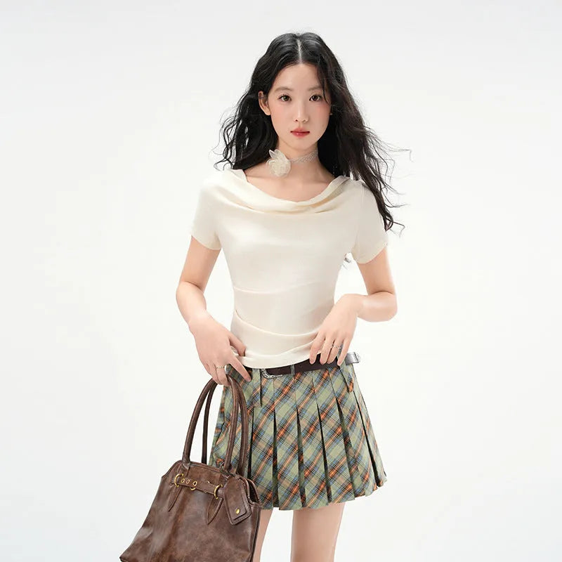 Women's one-shoulder draped neckline short sleeve top in slim fit with pleat detail, shown in Apricot