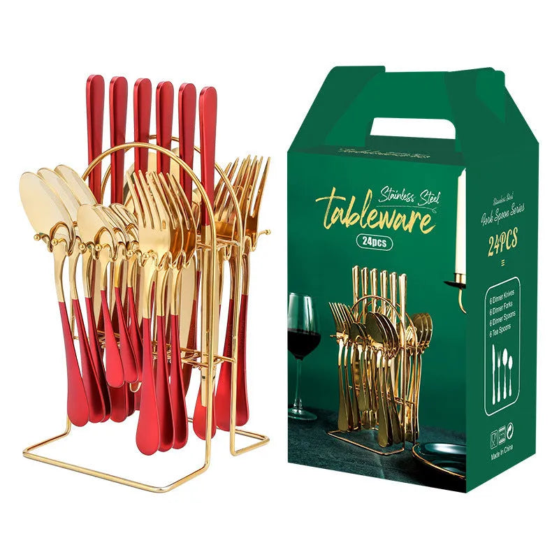 24-piece stainless steel cutlery set with knives, forks, spoons, and teaspoons on a storage rack in a gold finish.