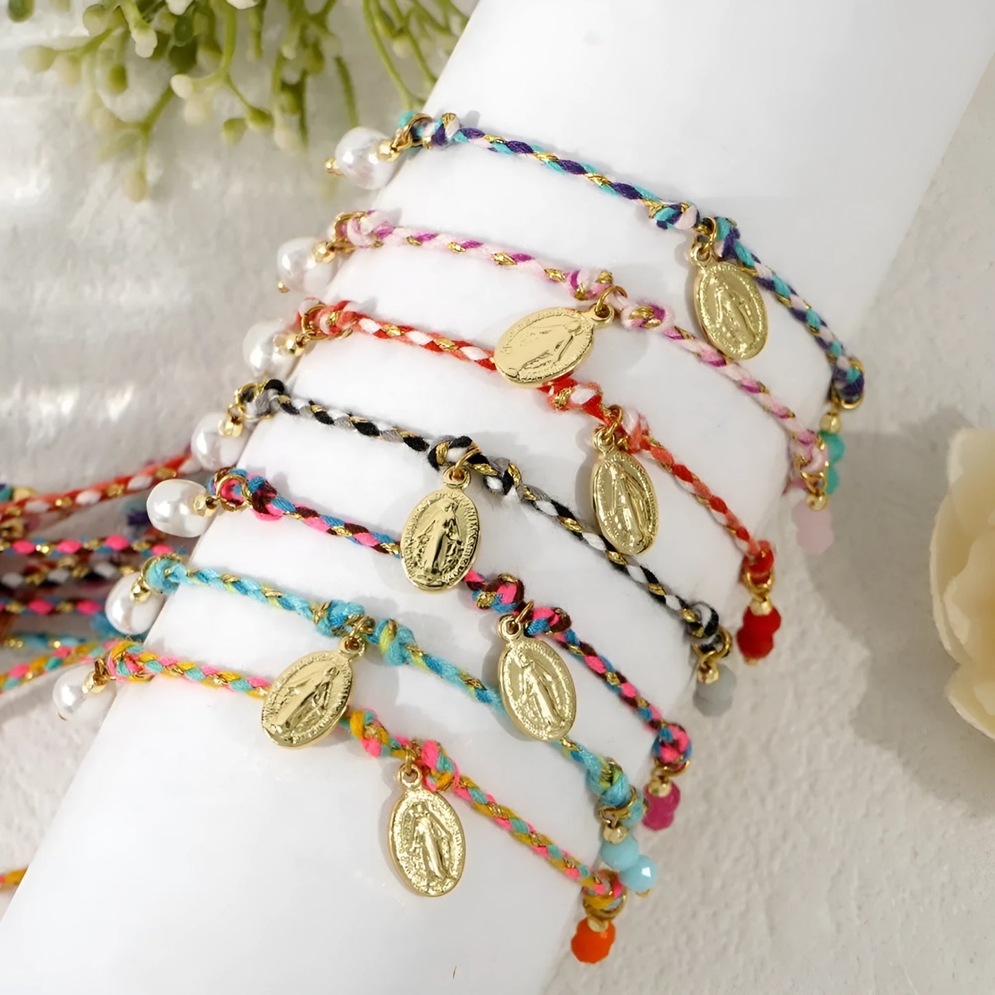 Close-up of a colourful hand-woven braided rope bracelet for women, showing ethnic strap design.