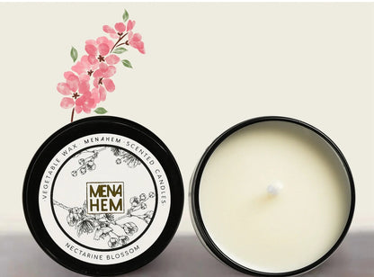 Black tin aromatic candle measuring 6cm diameter by 4cm height with soybean wax and natural wick