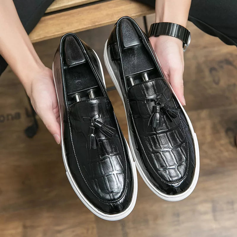 Men's business casual sneakers in black and wine red with leather-like finish and decorative tassels