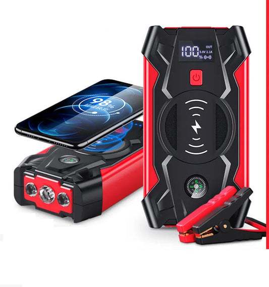Red car emergency jump starter with digital display showing voltage, thick battery clips, measuring 190x90x45mm