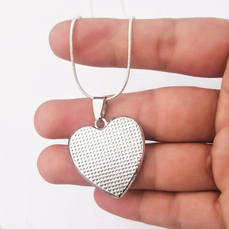 Heart-shaped epoxy necklace on a snake chain, available in gold and silver