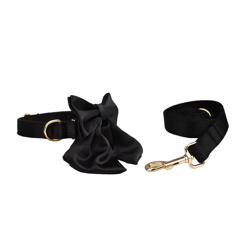 Complete dog walking set with cloth collar, leash, bow, and vest accessories